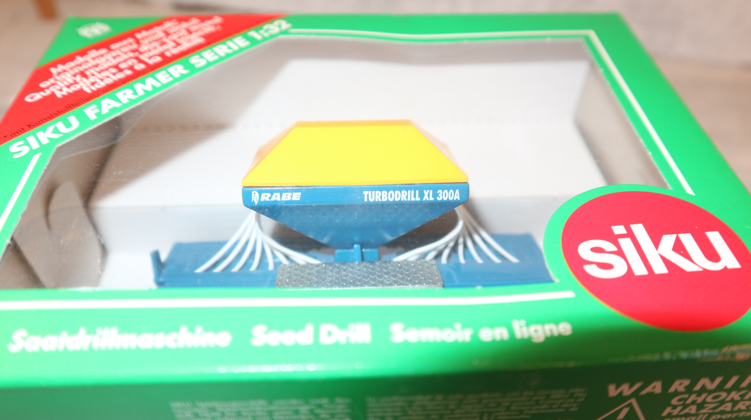 Siku 2261 in 1:32, Saatdrillmaschine RABE blau gelbes Dach, NEU in OVP