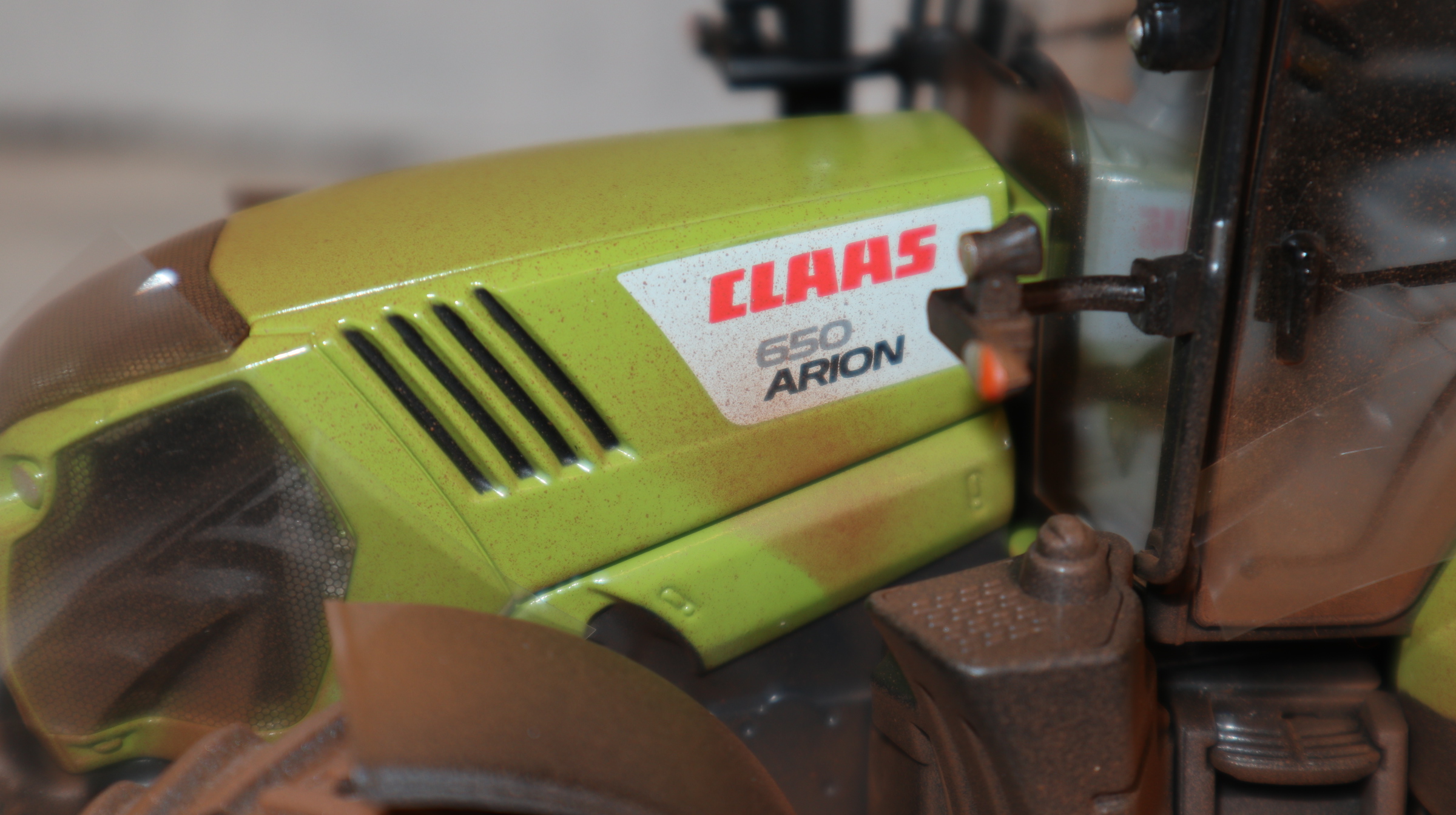 Wiking 017160600 in 1:32,  Claas Arion 650 DIRTY, NEU in OVP