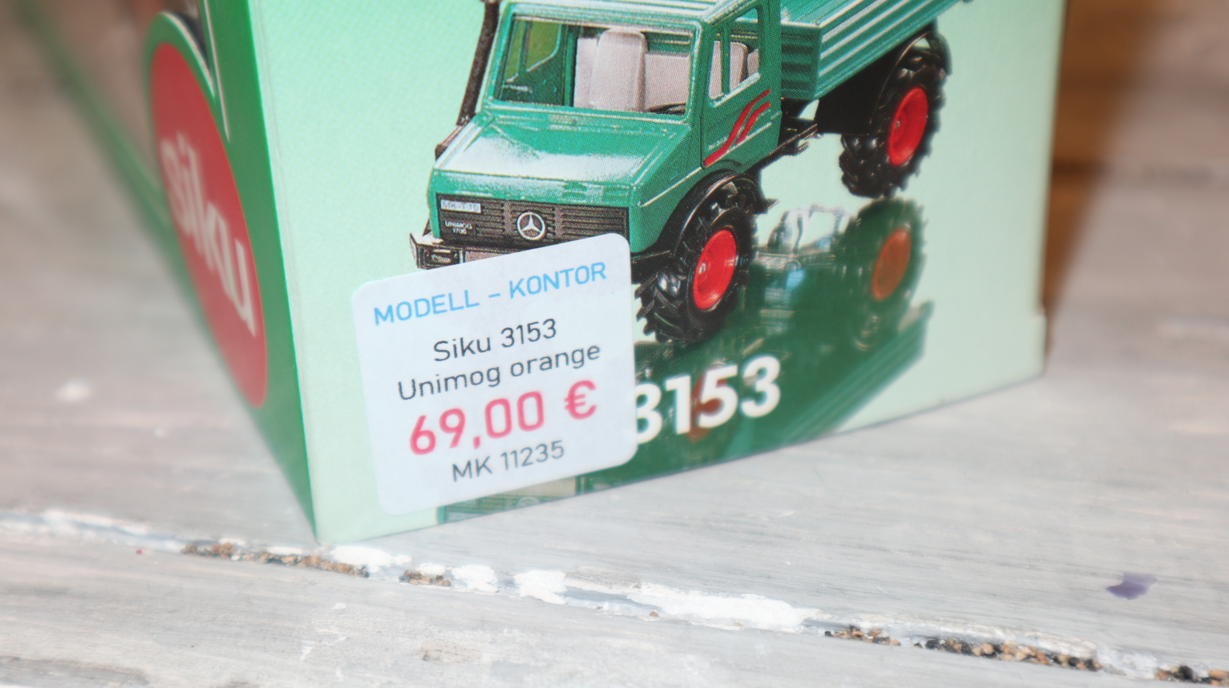 Siku 3153 in 1:32, Unimog 1700 in orange , NEU in OVP