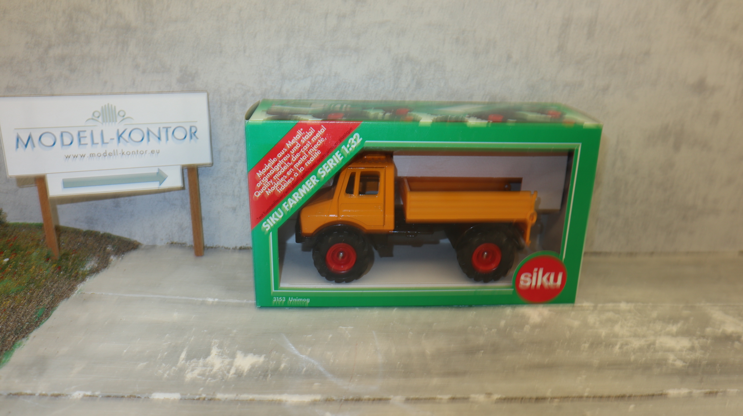 Siku 3153 in 1:32, Unimog 1700 in orange , NEU in OVP