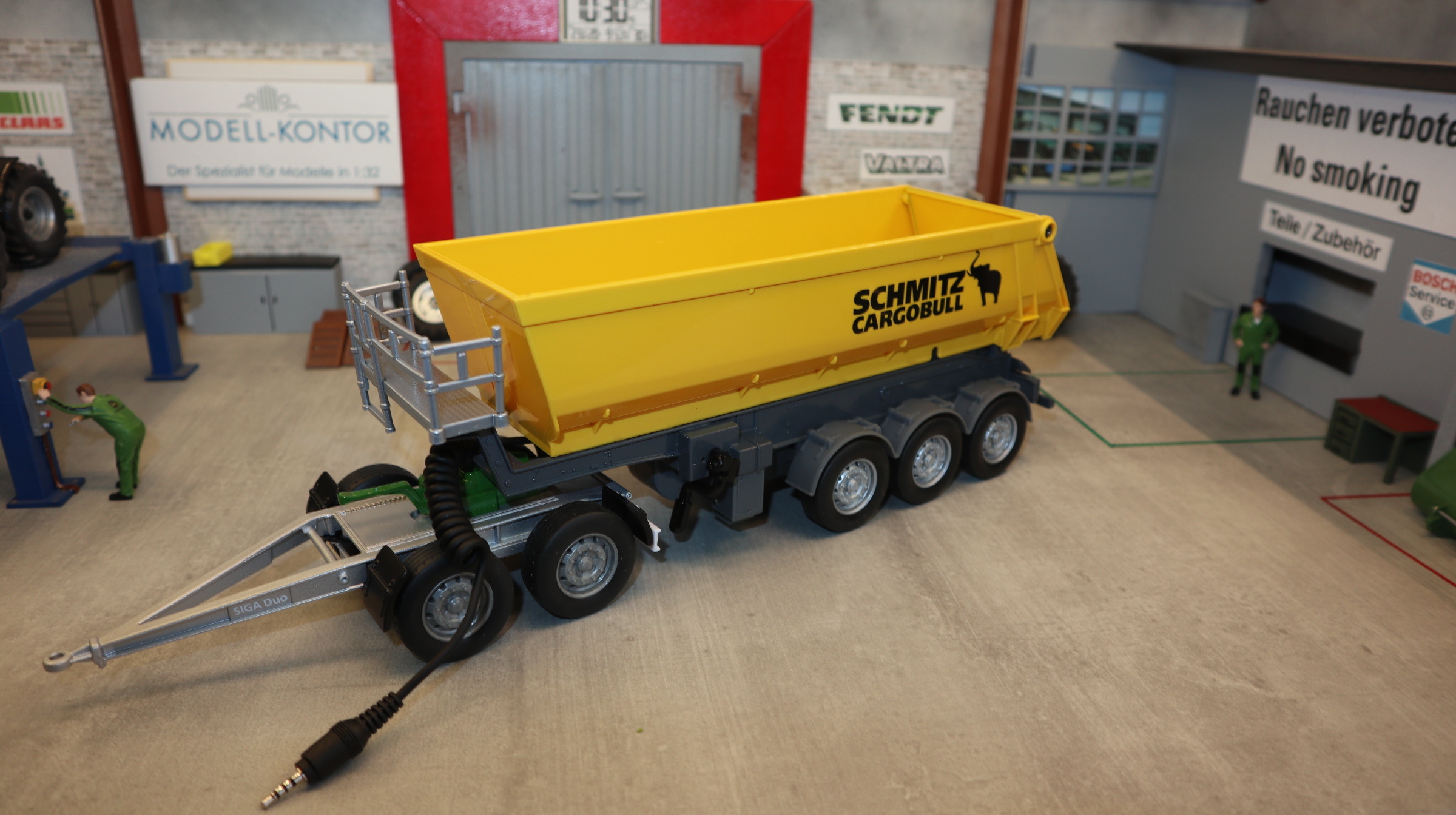 Siku 6734 + 2887 als Set in 1:32,  Kipper gelb Control mit SIGA Dolly silber-grün NEU in OVP
