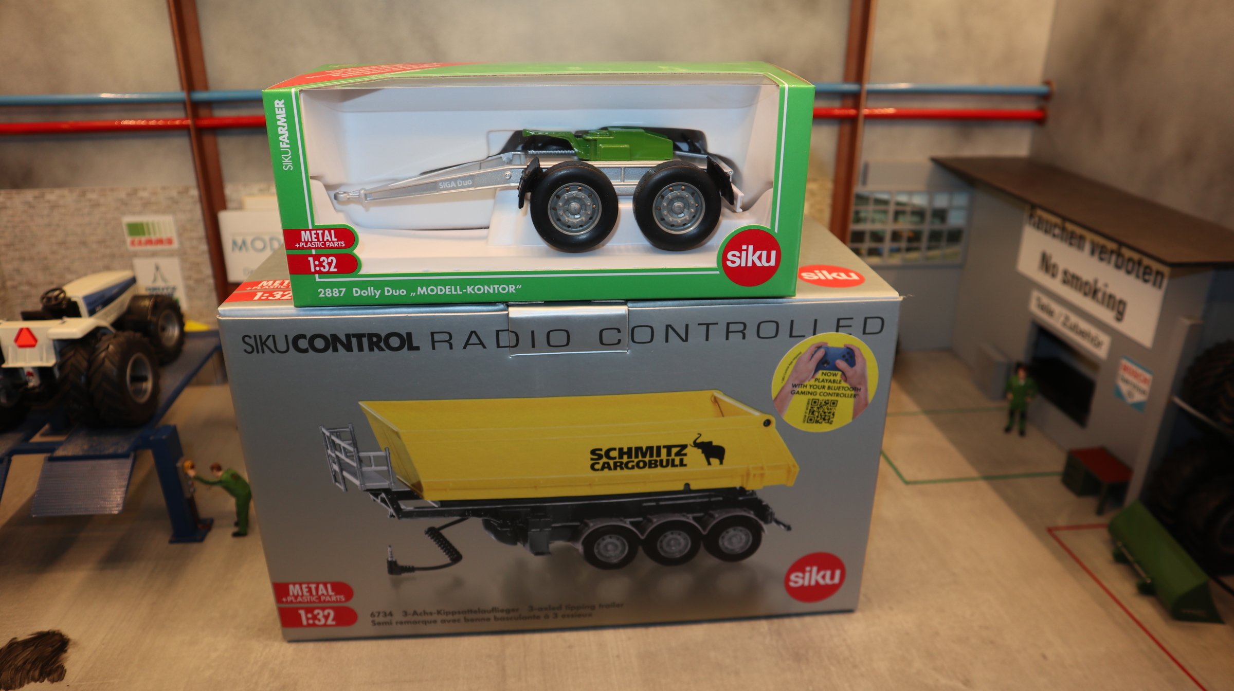Siku 6734 + 2887 als Set in 1:32,  Kipper gelb Control mit SIGA Dolly silber-grün NEU in OVP