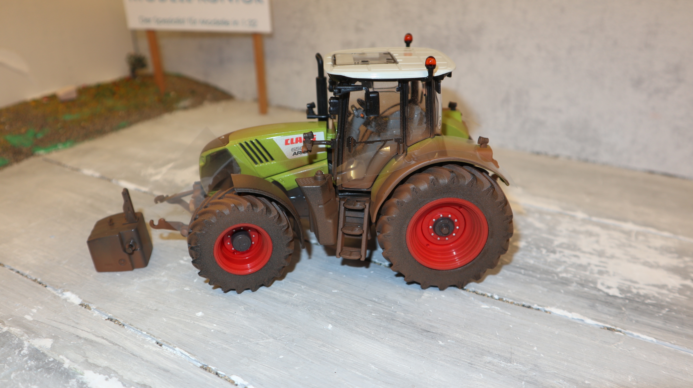 Wiking 017160600 in 1:32,  Claas Arion 650 DIRTY, NEU in OVP