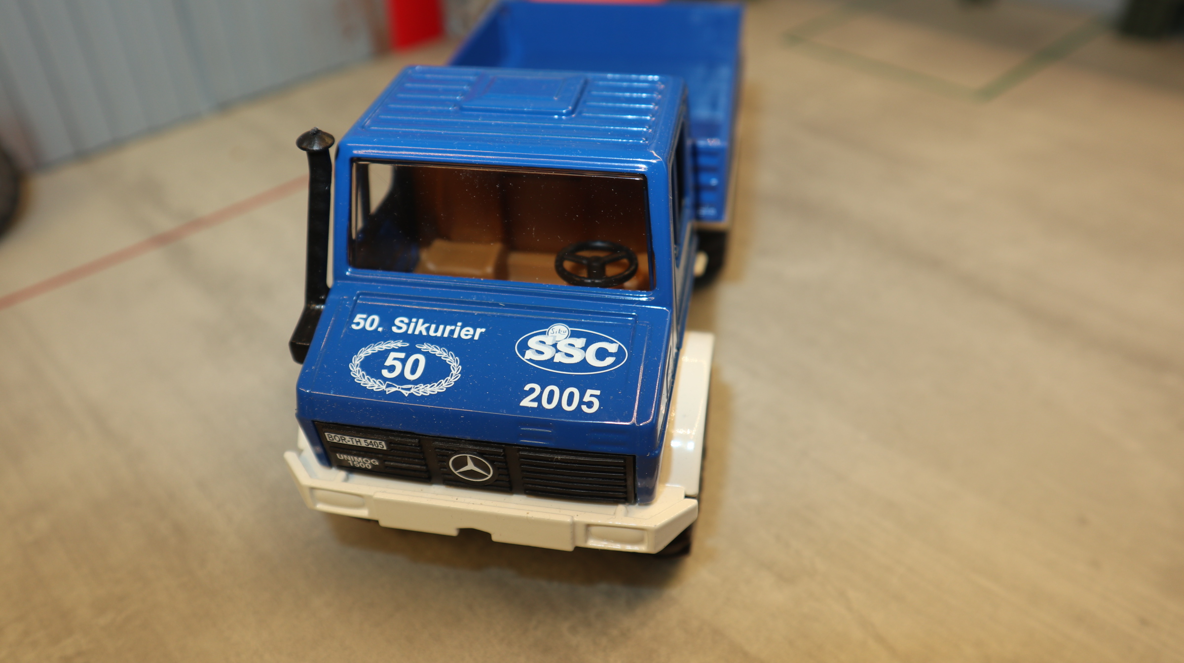 Siku 3153 in 1:32, UNIMOG 1700, Sondermodell blau-weiß, SSC 2005, NEU in OVP
