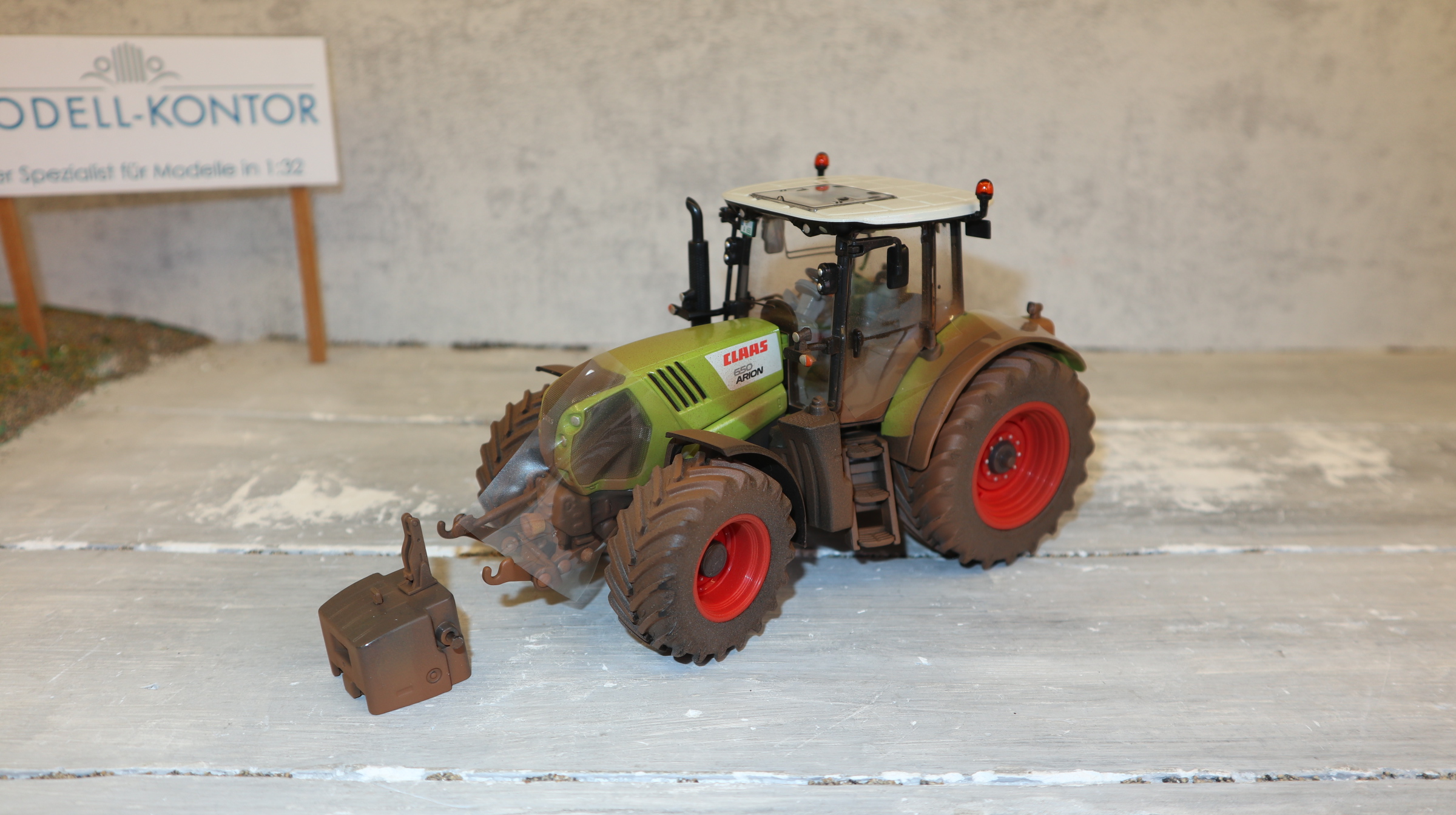 Wiking 017160600 in 1:32,  Claas Arion 650 DIRTY, NEU in OVP
