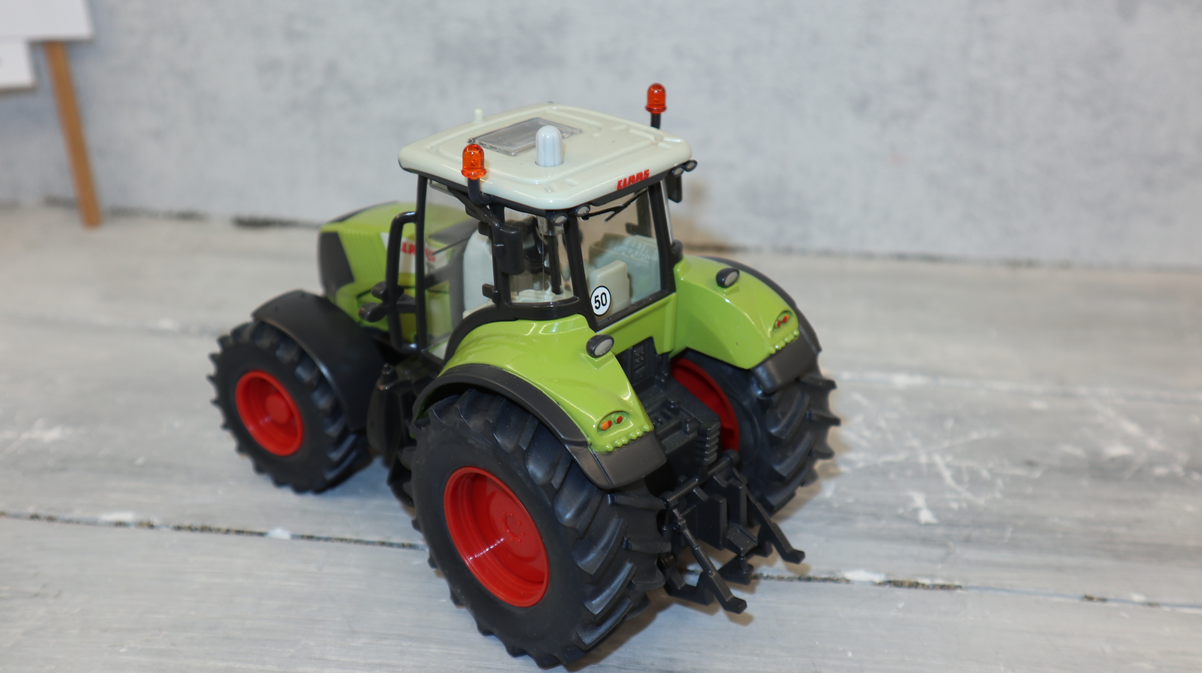 Siku 3261 in 1:32 Claas Axion 850,  NEU in OVP