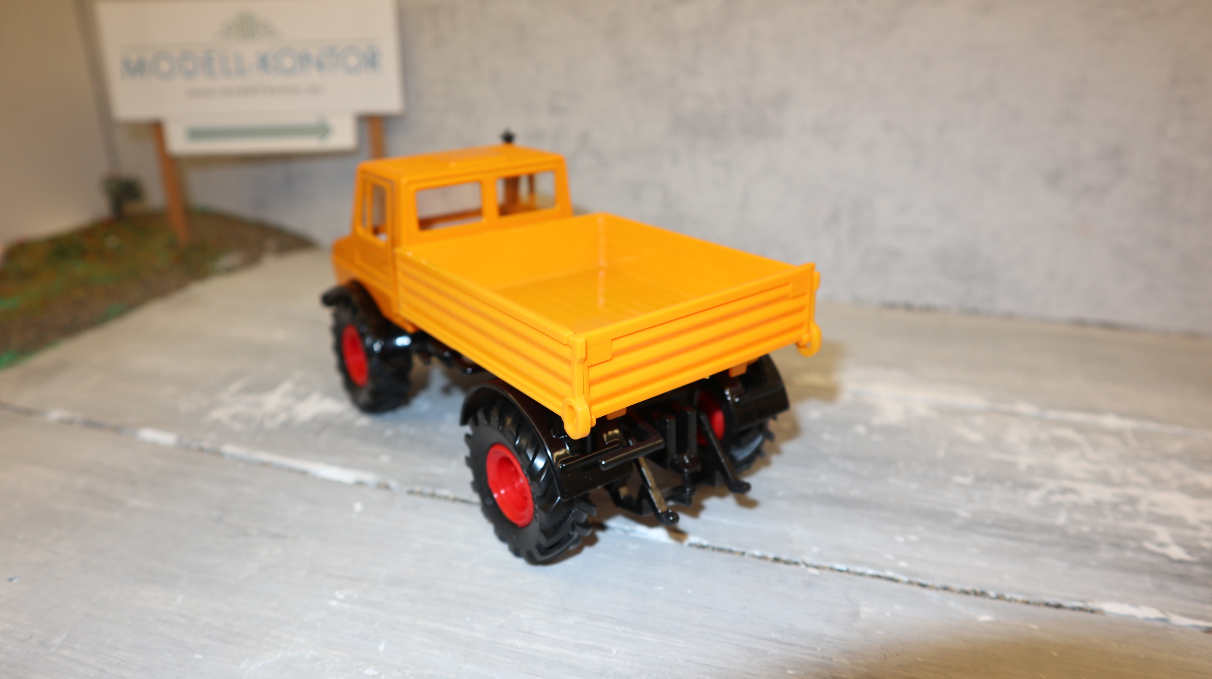 Siku 3153 in 1:32, Unimog 1700 in orange , NEU in OVP